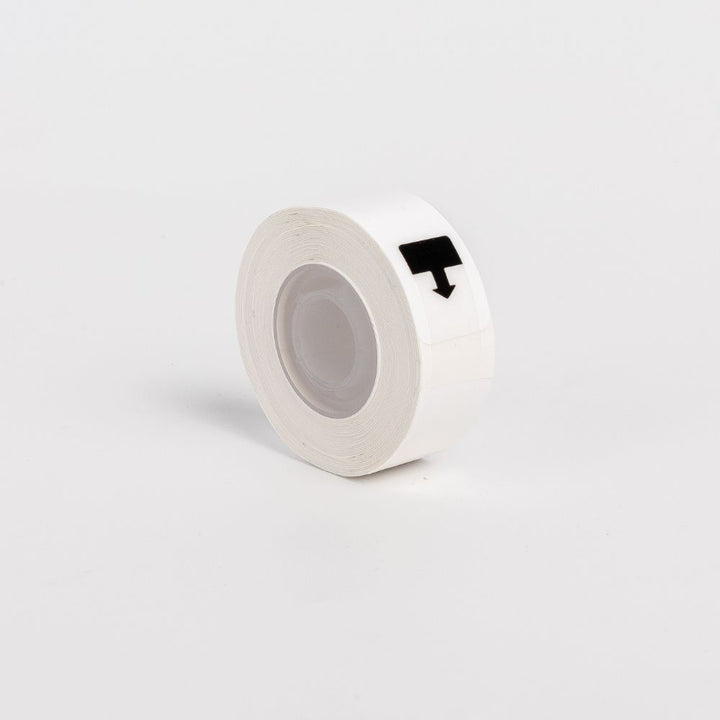 D32 white thermal label printer on a roll, ideal for shipping and organizing items efficiently