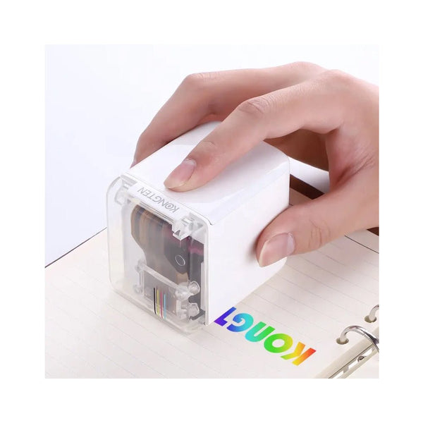 HAIKE Mbrush color hand printer being used to print colorful text on notebook paper